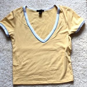 Yellow cropped shirt